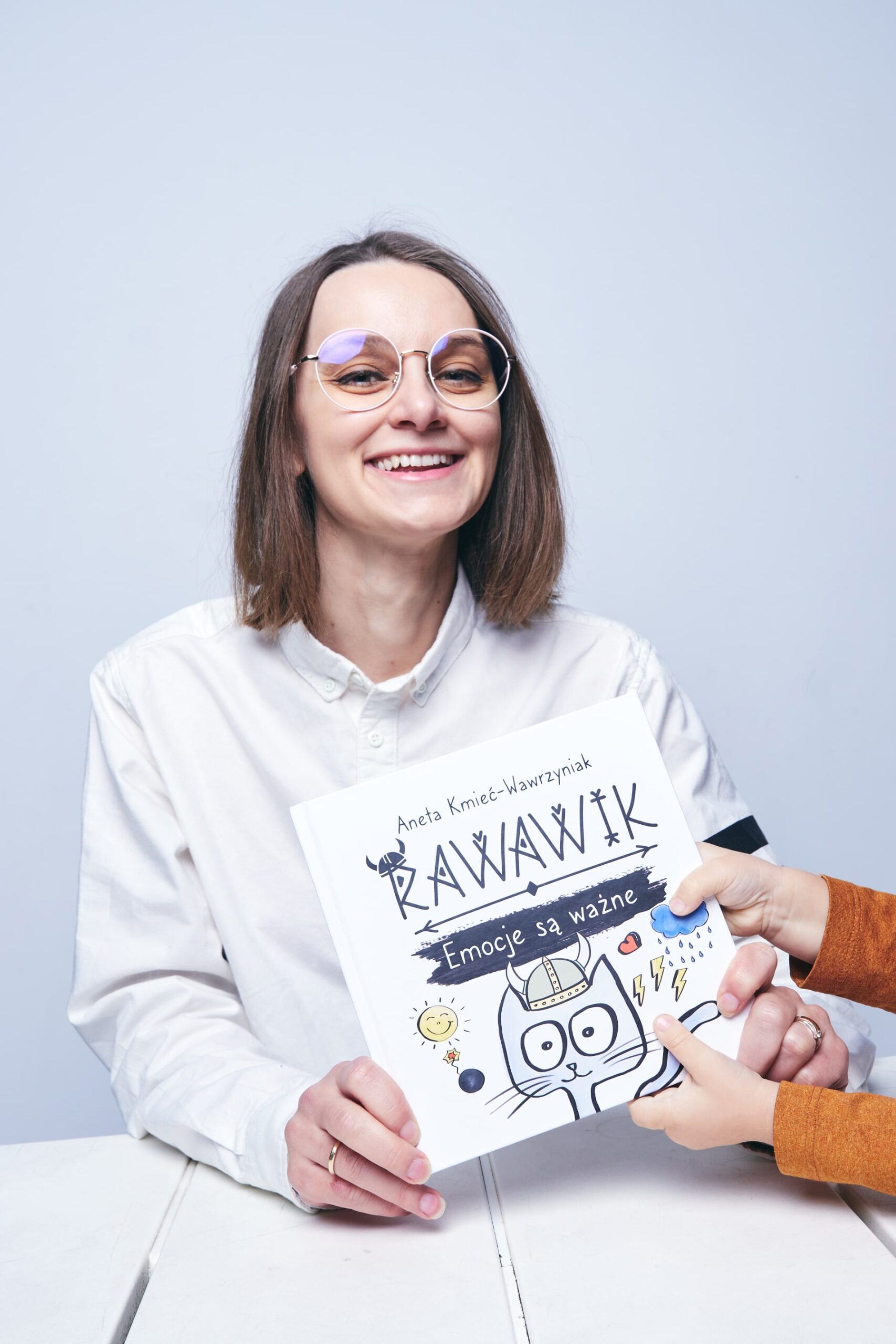 aneta kmieć-wawrzyniak autorka książek dla dzieci o kocie Rawawiku, ilustratorka, graficzka